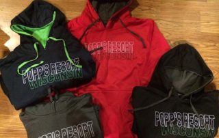 Black and Red Popp's Resort hooded sweaters.